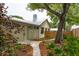 Charming exterior with beautiful landscaping, a gravel pathway, and well-maintained greenery at 922 Kincade Dr, Mount Pleasant, SC 29464