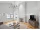 Modern living room featuring high ceilings, fireplace, and natural light at 922 Kincade Dr, Mount Pleasant, SC 29464