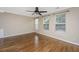 Inviting bedroom with hardwood floors, a ceiling fan, and plenty of natural light at 9305 Sweetbay Ct, Ladson, SC 29456