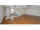 Spacious bonus room featuring hardwood floors, two ceiling fans and 2 closets at 9305 Sweetbay Ct, Ladson, SC 29456