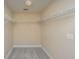 Empty walk-in closet with wire shelving, ready for customized storage solutions at 9305 Sweetbay Ct, Ladson, SC 29456