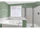 Modern bathroom featuring a separate shower and soaking tub at 1025 Mathis Ferry Rd, Mount Pleasant, SC 29464