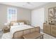 Bedroom featuring a white ceiling fan and a rattan bedframe at 1025 Mathis Ferry Rd, Mount Pleasant, SC 29464