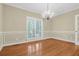 Empty dining room featuring natural light and hardwood floors at 1025 Mathis Ferry Rd, Mount Pleasant, SC 29464