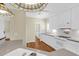 The kitchen features modern stainless steel appliances, a pantry, and a seamless flow into the dining area at 1025 Mathis Ferry Rd, Mount Pleasant, SC 29464