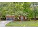 Inviting brick home with a well-maintained lawn and charming front entrance at 103 Sylvan Ter, Summerville, SC 29485