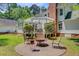 Spacious backyard with patio, pergola, and fire pit at 107 Kimberwicke Dr, Summerville, SC 29483