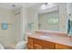 Cozy bathroom featuring floral wallpaper, a toilet, and a wood vanity at 107 Kimberwicke Dr, Summerville, SC 29483