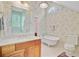 Bathroom with wood cabinets, white countertops, and a classic standalone tub at 107 Kimberwicke Dr, Summerville, SC 29483