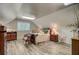 Cozy bedroom features sloped ceilings, vinyl floors, and an inviting atmosphere at 107 Kimberwicke Dr, Summerville, SC 29483