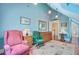 Bedroom with hardwood floors, sitting area, and natural light from the window at 107 Kimberwicke Dr, Summerville, SC 29483