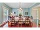 Charming dining room with hardwood floors, ample natural light, and stylish decor at 107 Kimberwicke Dr, Summerville, SC 29483