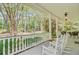 Relaxing front porch with comfortable seating, offering a serene outdoor space to enjoy the surroundings at 107 Kimberwicke Dr, Summerville, SC 29483