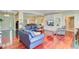 Open-concept living room with hardwood floors, comfortable seating, and bright natural light at 107 Kimberwicke Dr, Summerville, SC 29483
