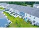 Backyards of new construction townhomes in a neighborhood setting at 108 Rosefield Ct, Summerville, SC 29485