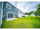 The backyard is fenced in and has a sliding glass door at 108 Rosefield Ct, Summerville, SC 29485