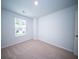 Bright bedroom with neutral carpet and a window for natural light at 108 Rosefield Ct, Summerville, SC 29485
