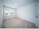 Bright bedroom with neutral carpet and a window for natural light at 108 Rosefield Ct, Summerville, SC 29485