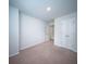 Spacious bedroom with neutral carpet, a double-door closet and a minimalist aesthetic at 108 Rosefield Ct, Summerville, SC 29485