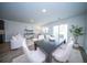 Stylish dining area featuring modern table, chairs, and open concept with living room at 108 Rosefield Ct, Summerville, SC 29485