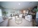 Open floor plan with dining area, kitchen, and living space with modern furnishings at 108 Rosefield Ct, Summerville, SC 29485
