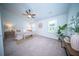 Spacious main bedroom with large windows, ceiling fan, walk-in closet and neutral decor at 108 Rosefield Ct, Summerville, SC 29485