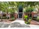 Inviting brick building entrance with lush landscaping and a welcoming compass design on the walkway at 1121 Basildon Rd, Mount Pleasant, SC 29466
