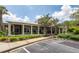 Welcoming clubhouse exterior with lush greenery and a parking area, offering a community gathering space at 1121 Basildon Rd, Mount Pleasant, SC 29466