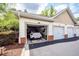 Attached garage showcasing a vehicle, built in shelving and extra storage space at 1121 Basildon Rd, Mount Pleasant, SC 29466