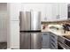 Contemporary kitchen featuring a stainless steel refrigerator, modern cabinets, and tiled backsplash at 1121 Basildon Rd, Mount Pleasant, SC 29466