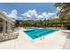 Large outdoor pool area featuring lounge chairs, umbrellas, and clear blue water for residents to enjoy at 1121 Basildon Rd, Mount Pleasant, SC 29466