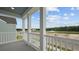 This is an outdoor balcony with a scenic water and treeline view, plus the beautiful white columns at 116 Midmills Ln, Summerville, SC 29486