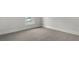 Bedroom with gray carpet and trim, neutral paint, and a window that provides ample natural light at 116 Midmills Ln, Summerville, SC 29486