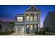 Charming two-story home with a covered porch and a one car garage at 116 Midmills Ln, Summerville, SC 29486