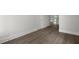 Hallway features new gray floors, white trim, and access to multiple rooms in the home at 116 Midmills Ln, Summerville, SC 29486