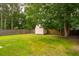 Backyard features a shed and a wooden fence that provides some privacy at 117 Ducane St, Summerville, SC 29483