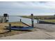Scenic community dock and ramp for easy access to the water for kayaking and other recreational activities at 1175 Reserve Ln, Awendaw, SC 29429