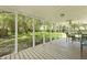 Back porch with a table and a view of the backyard at 125 Crooked Creek Ct, Summerville, SC 29486