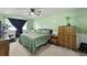 Comfortable bedroom with light green walls, a ceiling fan, and carpet flooring at 125 Crooked Creek Ct, Summerville, SC 29486