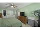 Bedroom featuring neutral carpet, ceiling fan, and comfortable furnishings at 125 Crooked Creek Ct, Summerville, SC 29486