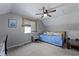Bedroom with a twin bed, ceiling fan and a bright window at 125 Crooked Creek Ct, Summerville, SC 29486