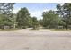Inviting neighborhood entrance with well-maintained landscaping and clear signage at 125 Crooked Creek Ct, Summerville, SC 29486