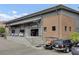 Gym exterior with grey and brick facade and parking spaces at 125 Pier View St # 209, Charleston, SC 29492