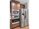 Modern kitchen with stainless steel appliances, including refrigerator, oven, and microwave at 125 Pier View St # 209, Charleston, SC 29492