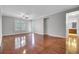 Spacious living room with hardwood floors, neutral walls, and abundant natural light at 125 Pier View St # 209, Charleston, SC 29492