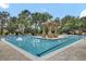 Community swimming pool with pergola and lounge chairs at 125 Pier View St # 209, Charleston, SC 29492