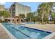 Relax in this beautiful pool with resort-style lounging and seating at 125 Pier View St # 209, Charleston, SC 29492