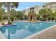 Resort-style pool with a sunning deck and shaded seating offers a luxurious living experience at 125 Pier View St # 209, Charleston, SC 29492