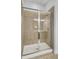 Shower with glass doors and tile surround at 125 Pier View St # 209, Charleston, SC 29492