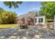 Backyard features a patio with an outdoor dining area at 13 Charlestowne Rd, Charleston, SC 29407